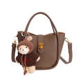 Brown lychee leather bucket bag with a plush bear charm and adjustable shoulder strap - With Pendant / Elephant Gray