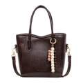 Dark coffee vintage bucket bag in faux leather with gold hardware and beaded charm - Brown