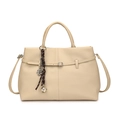 Beige lychee pattern leather tote bag with decorative charms and adjustable strap - Beige