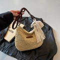 Sac seau en paille tressée beige avec bandoulière en cuir brun et nœud en dentelle blanche - Taille unique / Blanc Cassé