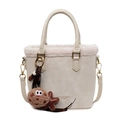 Cream suede shoulder bag with faux fur trim and cute charms for winter fashion - With Pendant / Off White