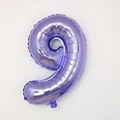 Close-up of a 30-inch purple foil number 9 balloon with metallic texture for party decor - Number 9