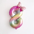 Rainbow gradient 40-inch number 8 foil balloon with star patterns and pink bow decoration - Number 8