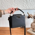 Black pebbled PU leather crossbody bag with golden CD logo and top handle for women - Black