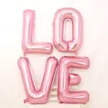Ballons lettres LOVE en aluminium rose métallisé pour décoration romantique - Kit Lettres LOVE Rose 32