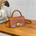 Retro shoulder bag with brown leather, leopard print fabric and golden metal lock - Brown