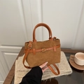 Bolso bucket de ante marrón mate con asas de cuero liso y hebilla metálica dorada - Marrón