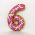 Détail d'un ballon en aluminium chiffre 6 thème donut avec glaçage rose et pépites - 32 pouces / Chiffre 6