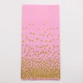 Detail of pink disposable tablecloth with metallic gold polka dots for party decoration - Pink Gold Polka Dot