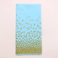 Detail of light blue rectangle tablecloth with gold foil gradient polka dots pattern - Blue Background Gold Polka Dot