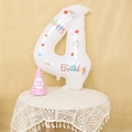 Detail of white number 4 balloon with colorful Happy Birthday prints and party hat - Number 4 (With Sticker)