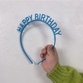 Vibrant blue plastic Happy Birthday headband with non-slip teeth for party decor - Blue