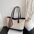 Beige canvas tote bag with black leather trim and decorative patterned silk scarf handle - Black