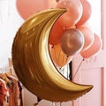 Detail of a large gold crescent moon foil balloon with a shiny metallic finish for weddings - 36 Inch / Rose Gold
