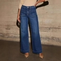 Detail van high-waisted jeans met wijde pijpen, grote opgestikte zakken en brede zomen - S / Donkerblauw