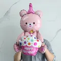 Pink 3D sitting bear foil balloon holding a colorful Happy Birthday cupcake topper - Pink Bear With Cake