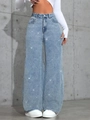 Detailed view of shimmering rhinestone embellishments on light blue wide leg denim jeans - XL / Sky Blue