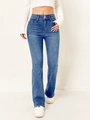 Dettaglio dei jeans svasati blu a vita alta con doppi bottoni e trama denim lavato - 2XL / Blu Vintage