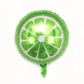 Lime shaped foil balloon with realistic fruit slice print on a clean white background - Lemon