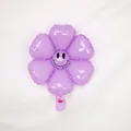 Purple sunflower foil balloon with a black smiley face print and metallic finish - Small Macaron Purple Smiling Daisy