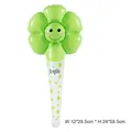 Green daisy flower balloon with a smile face and floral handle for party decor - Macaron Green Daisy Inflatable Wand