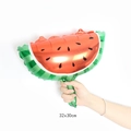 Detail shot of a 16-inch watermelon foil balloon for kids birthday party decoration - Mini Watermelon