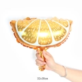 Close-up of a 16-inch orange slice foil balloon decoration measuring 32x30cm - Mini Orange