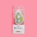 Golden glitter number 9 birthday candle with blue trim and mini crown in packaging - Number 9 (4409458047959)