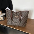 Vintage brown monogram tote bag with gold bow detail and spacious shoulder straps - Brown
