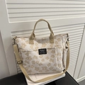 Large floral canvas tote bag in cream with yellow flowers and adjustable crossbody strap - Khaki