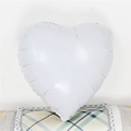Detail of a white heart-shaped foil balloon with smooth metallic texture and sealed edges - 18-Inch White Heart