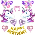 Flat lay of unicorn birthday balloon set with gold Happy Birthday letters and heart shapes - Purple Unicorn Gold Birthday