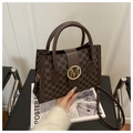 Detail of coffee brown tote bag with M-letter print and golden round buckle - Coffee