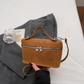 Brown suede handbag featuring silver heart-shaped zippers and slender shoulder strap - Brown