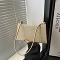 Chic beige straw woven shoulder bag with striped charm for summer vacation style - Khaki