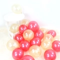 Pearlescent round latex balloons in rose pink and champagne for party decorations - Gold+Red