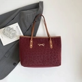 Chic burgundy leopard print tote bag with gold bow detail and brown leather straps - Red