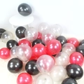 Mix of pearlescent red, black, and transparent latex balloons for party decorations - Black + Red + Silver