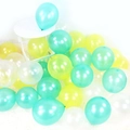 Pearlescent latex balloons in mint green, lime green, and pearl white for party decor - Green + Yellow + White