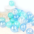 Pearlescent latex balloons in light blue, mint green, and white for party decor - Blue + Light Blue + White