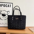 Borsa tote nera a pieghe con motivi a fiocco bianchi e finiture in oro - Nero