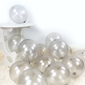 Translucent gray 1.2g latex balloons scattered on carpet for elegant party decoration - Silver