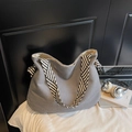 Gray corduroy tote bag with striped webbing handles and a trendy knot design - Gray