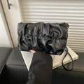 Fashionable black pleated cloud bag with elegant crossbody strap and matte finish - Black