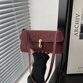 Fashionable burgundy underarm bag with leopard texture and gold oval lock detail - Red