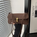 Dark brown minimalist leather shoulder bag with gold clasp and subtle leopard texture - Brown