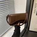 Minimalist coffee brown glossy patent leather shoulder bag with stylish knot strap detail - Brown