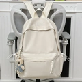 Minimalist beige campus backpack with cute teddy bear charm on ergonomic office chair - White (with Pendant)