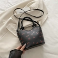 Fashionable black cherry print bucket bag with leather handles and silver hardware - Black