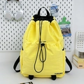 Vibrant yellow drawstring backpack with black accents for gym, travel, and outdoor sports - Light Yellow